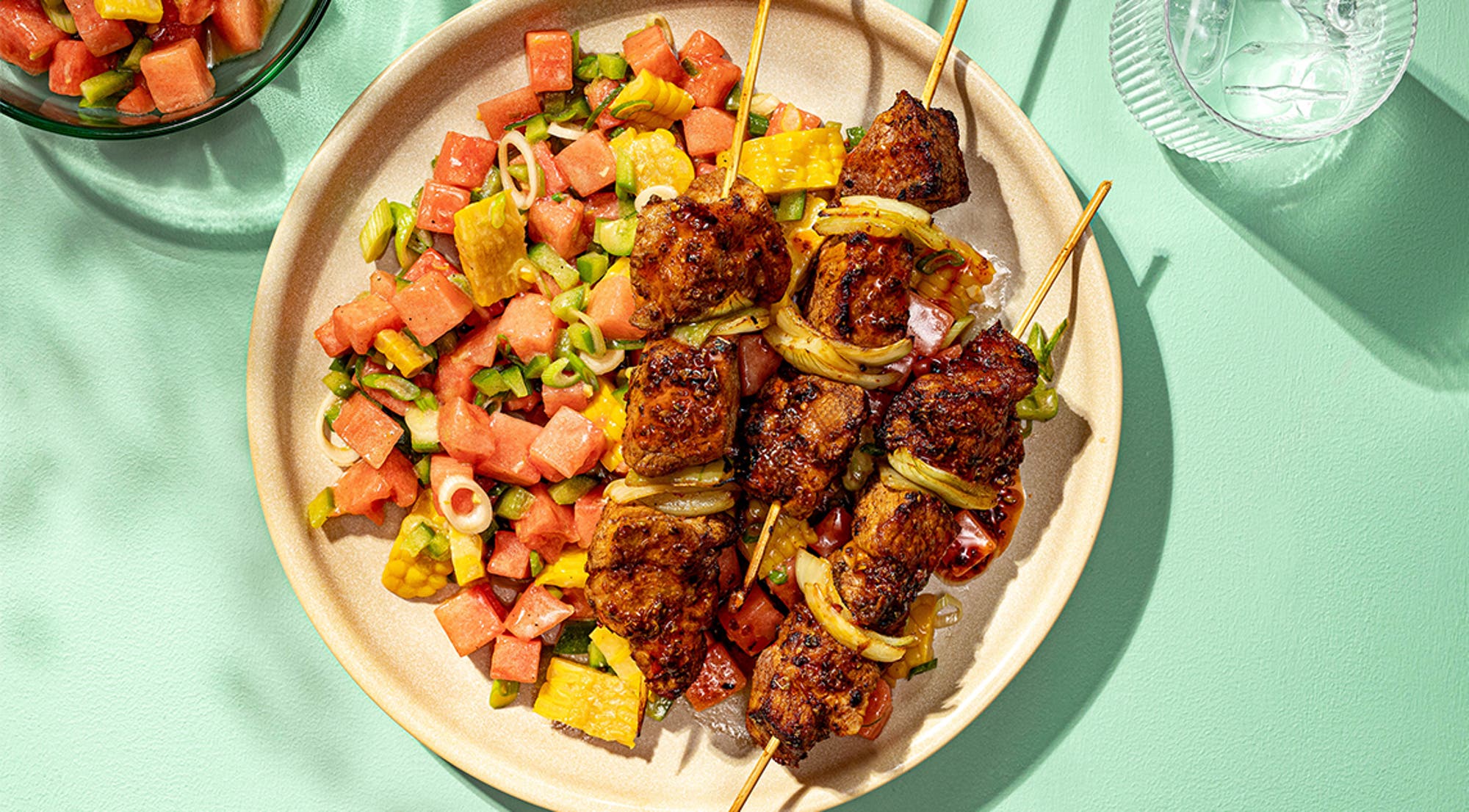 Asados av svinenakke med vannmelonsalat