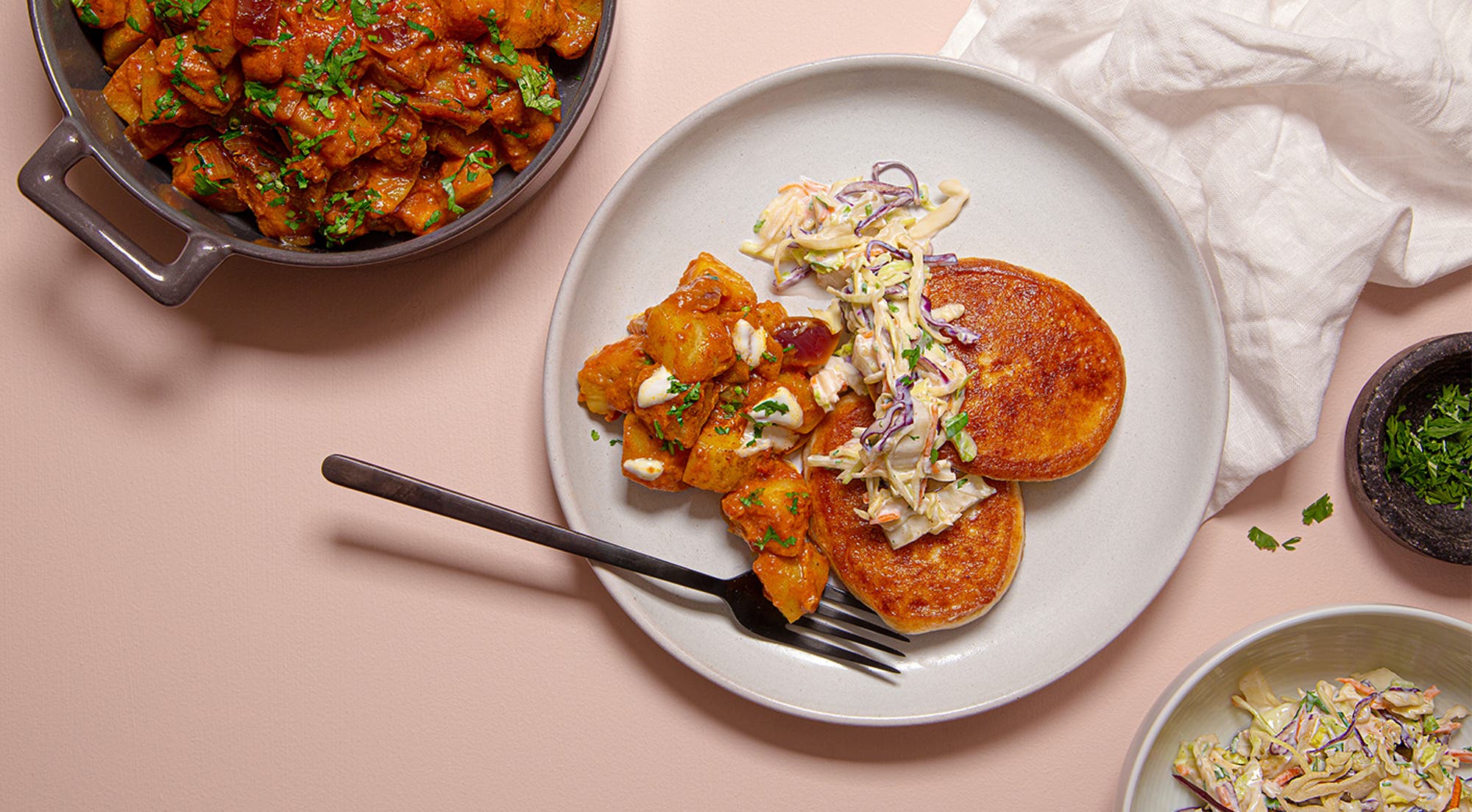 Fiskekaker med tikka masala-poteter