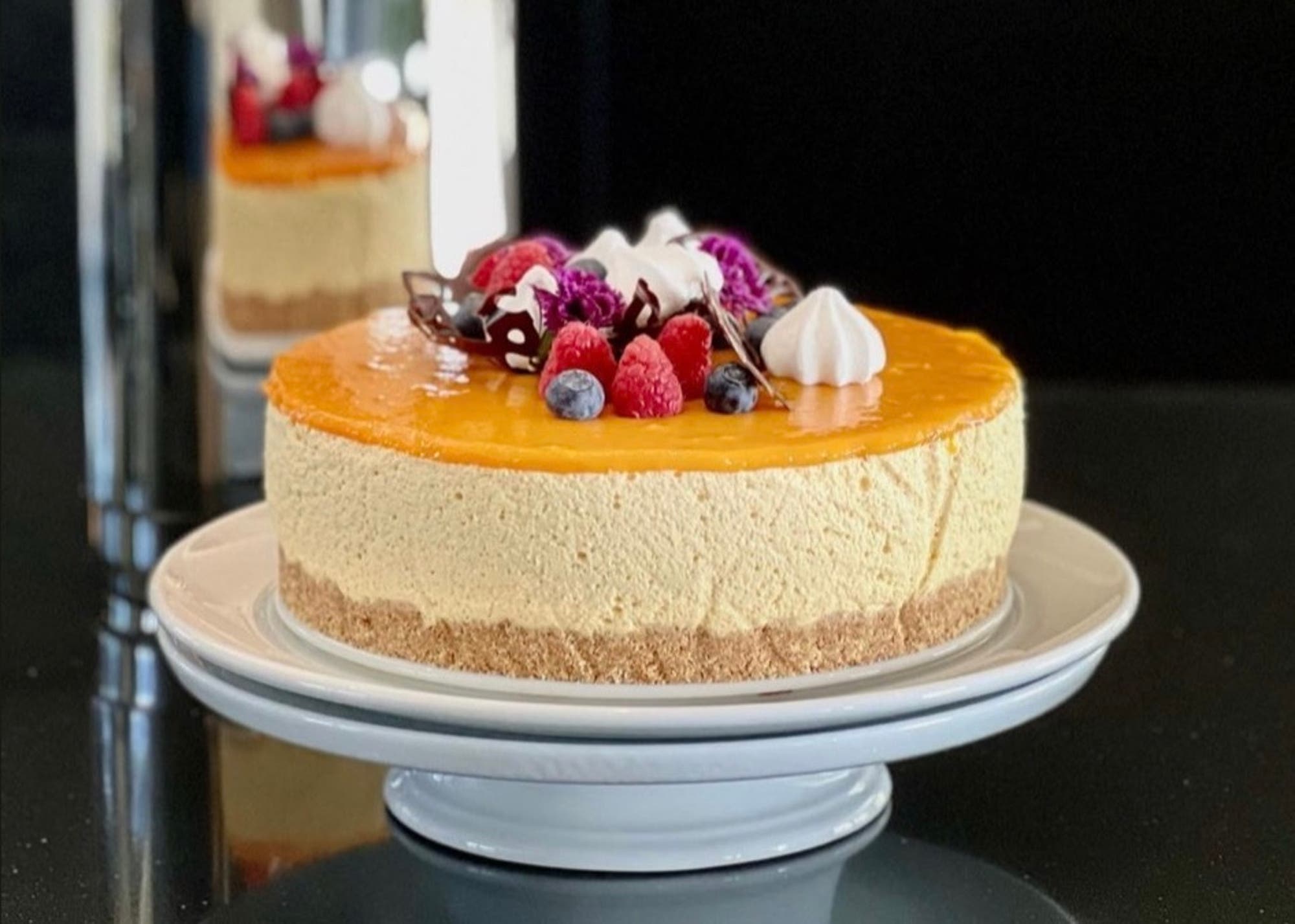 Ostekake med mangopuré